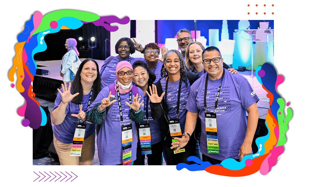 A group of CSTA IMPACT fellows standing and smiling in front of a stage.